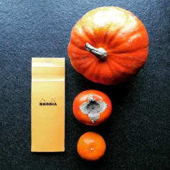 Cuaderno cuadros naranja Rhodia 7,4x21cm